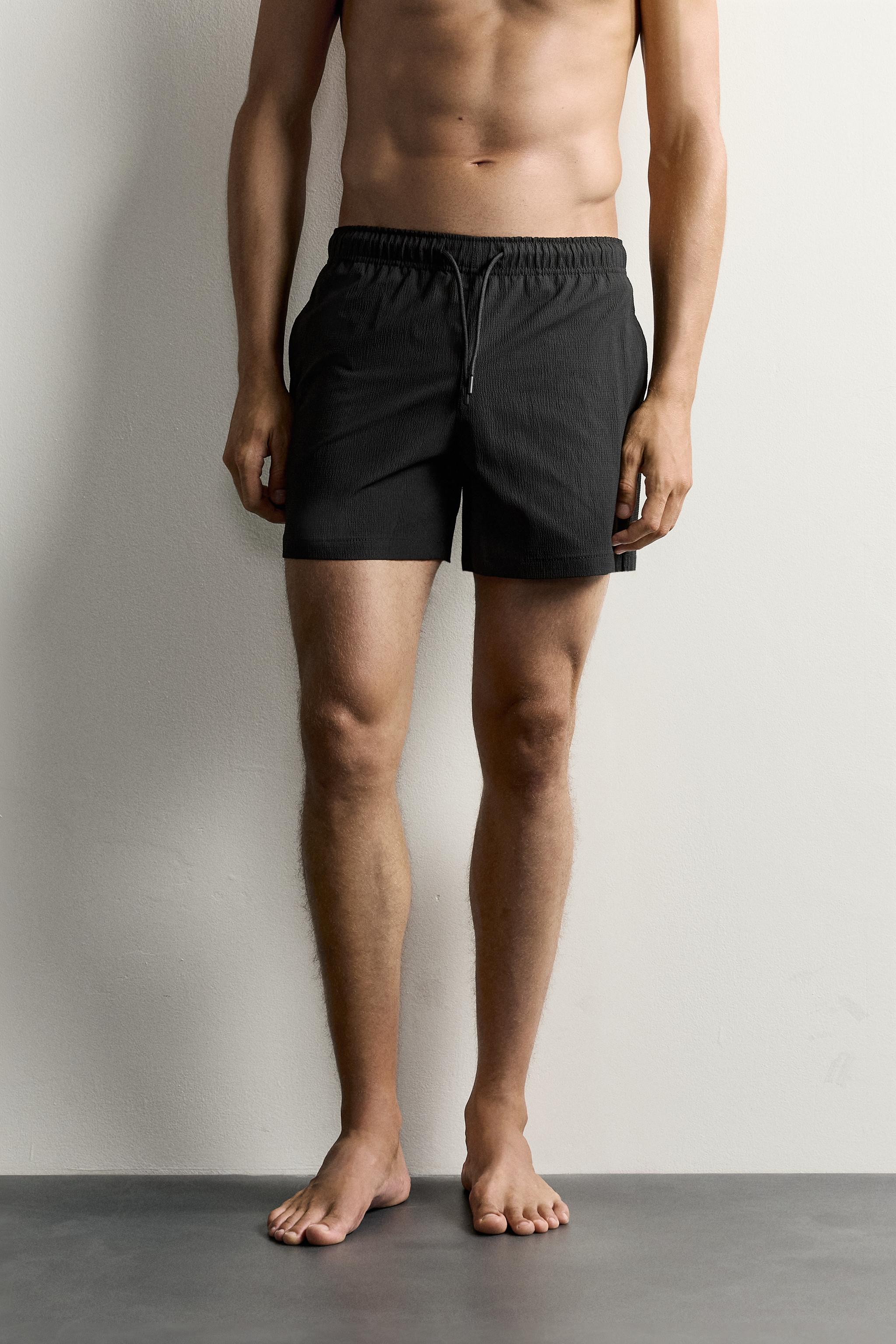 TEXTURED MID-LENGTH SWIMSUIT